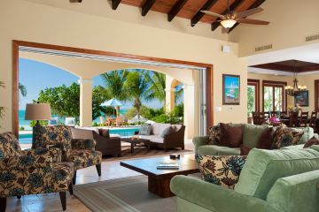 Expansive main living, dining, pool area with ocean view